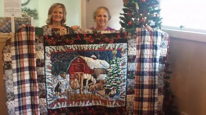 Prisoners Create Christmas Quilt to Benefit Pregnancy Center’s Fatherhood Initiative
