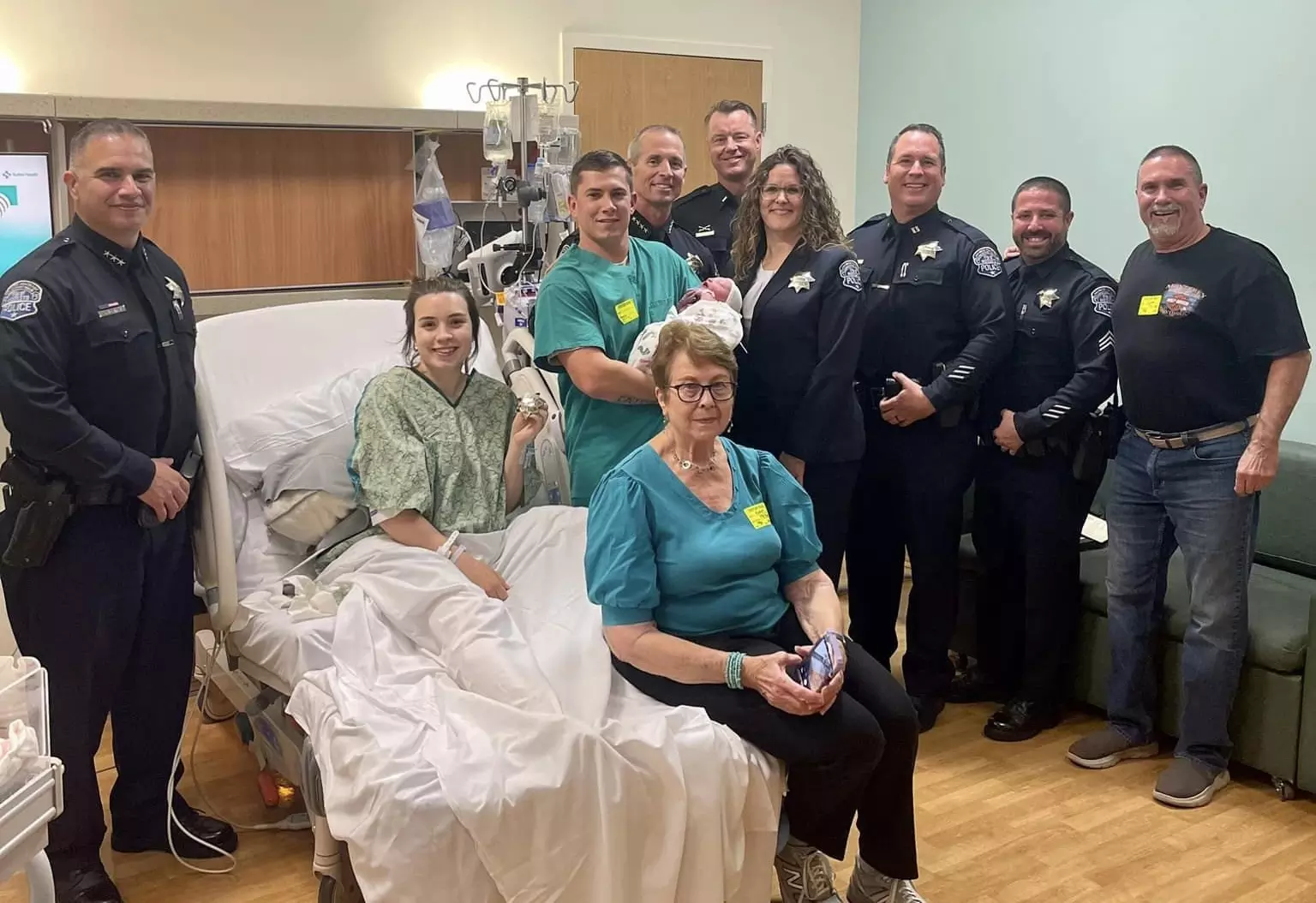 Police dept. throws surprise ceremony so new cadet could graduate with his baby